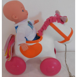 Cheval à tirer avec poupon